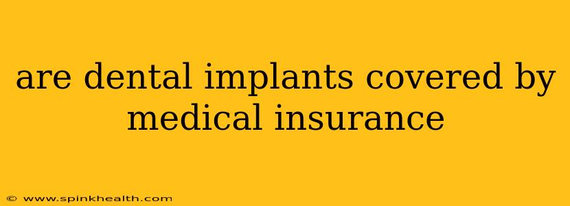 are dental implants covered by medical insurance